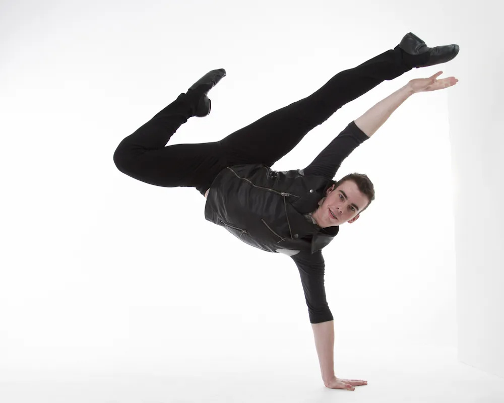 A student performing in jazz dance class
