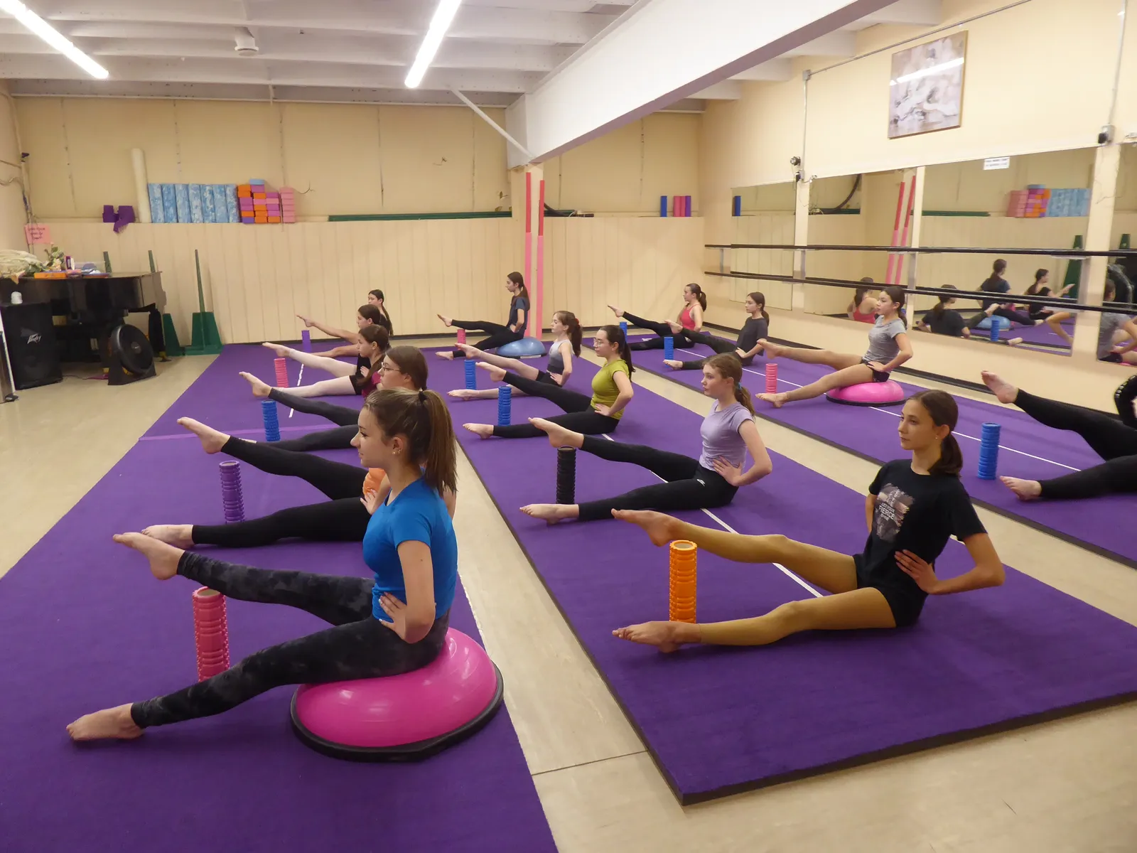Students in a stretching dance class