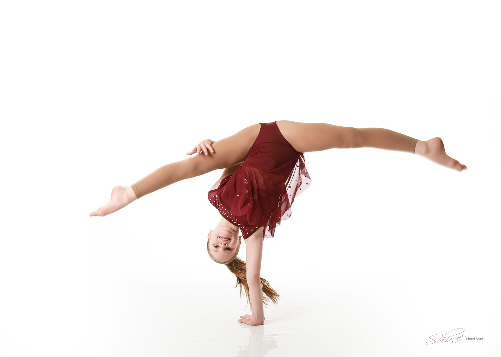 Student performing in an acro dance class